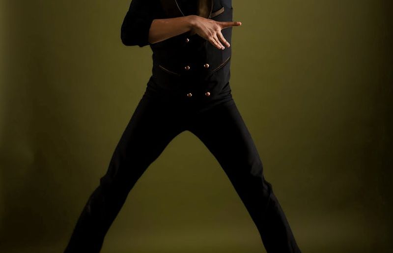 Person captured mid-movement in a dynamic pose.